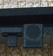 Frame supports between which o slide key panel (bottom)