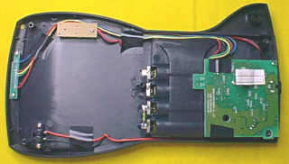 How to disassemble an Apple Newton Messagepad 1x0 charging station, image 6 of 12. Copyright (c) 2002 Frank Gruendel